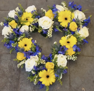 Yellow and Blue heart - Open heart tribute ,loose flowers. Can be made in colours of your choice.